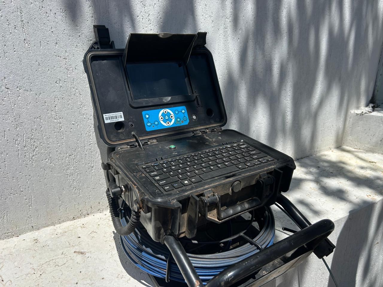 CCTV drain camera control case with monitor, keyboard and coiled inspection cable
